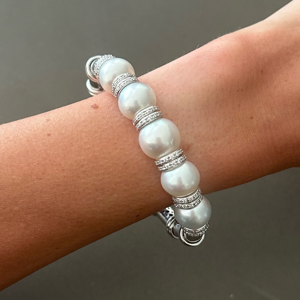 18 karat white gold hinged cuff bangle bracelet with five cultured pearls